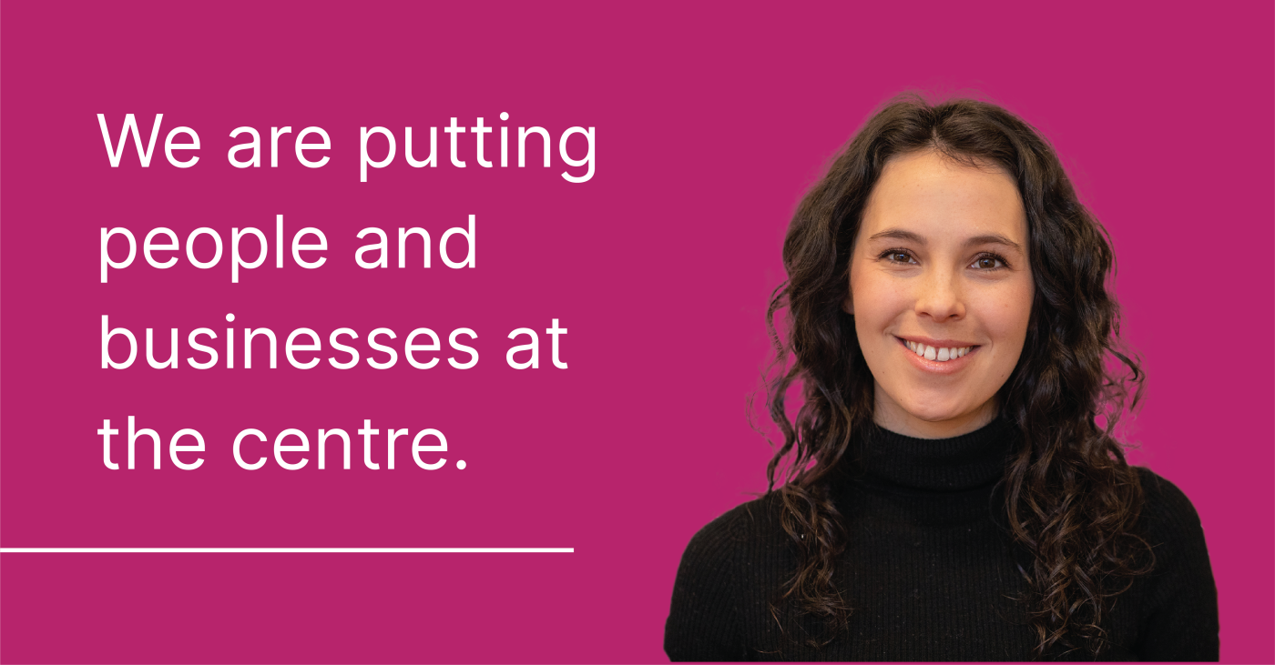 Image of a woman with text - We are putting people and businesses at the centre.